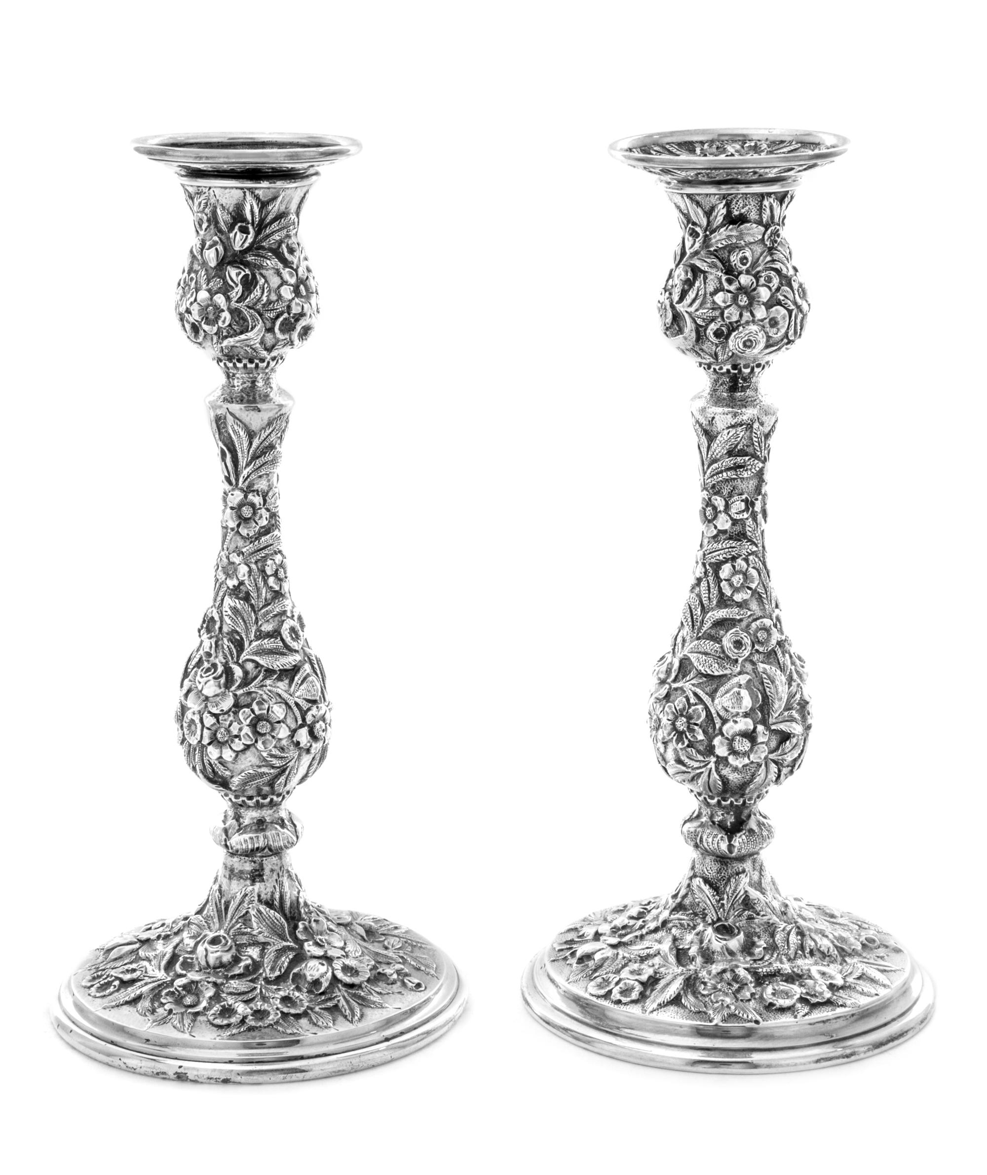 A Pair of American Silver Candlesticks, S. Kirk & Son, Baltimore, MD, Repousse pattern, weighted.
