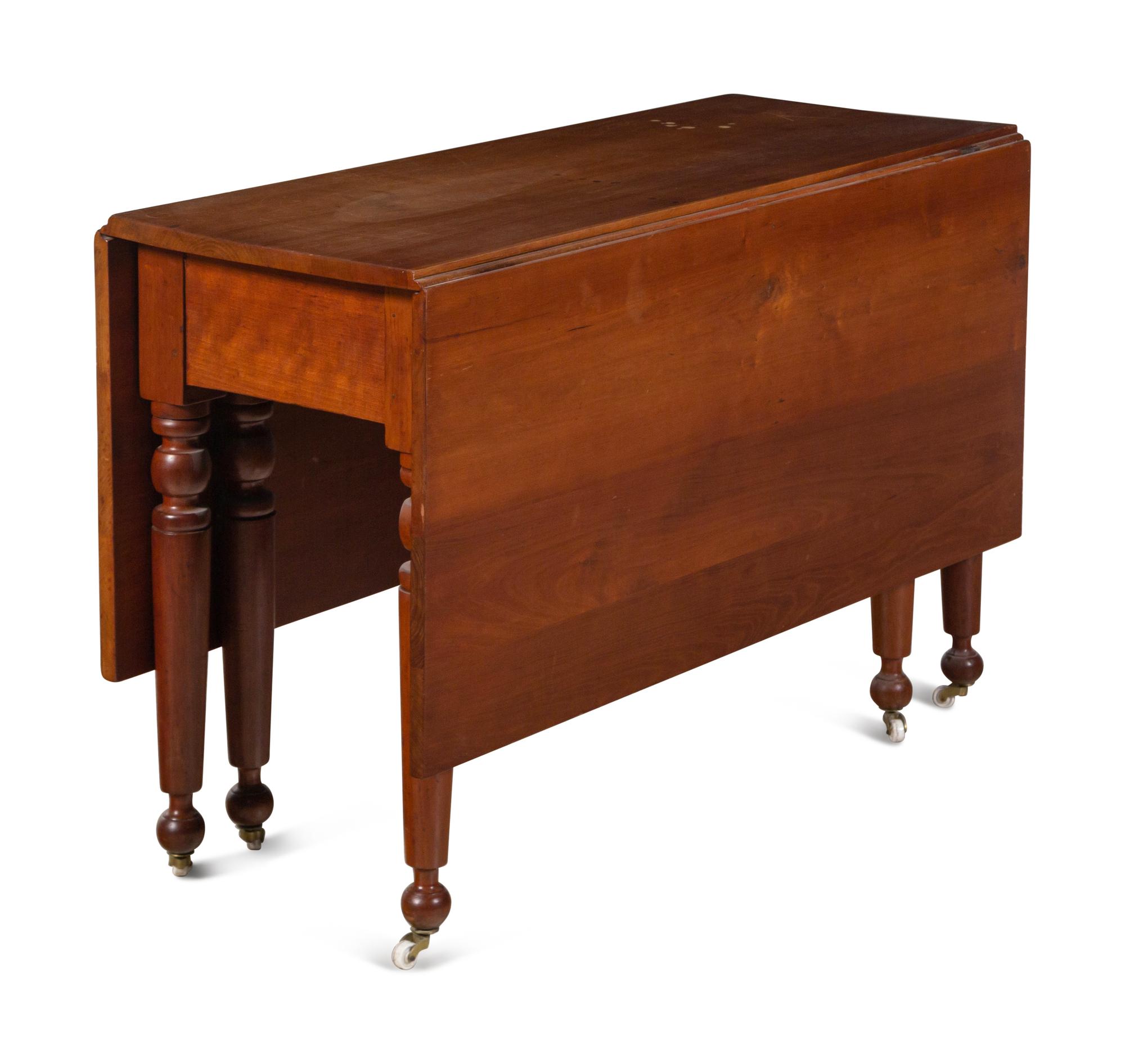 A Late Federal Cherrywood Drop-Leaf Dining Table (Please send consignor donation receipt once donated)