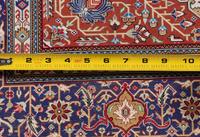 A Signed Silk Rug