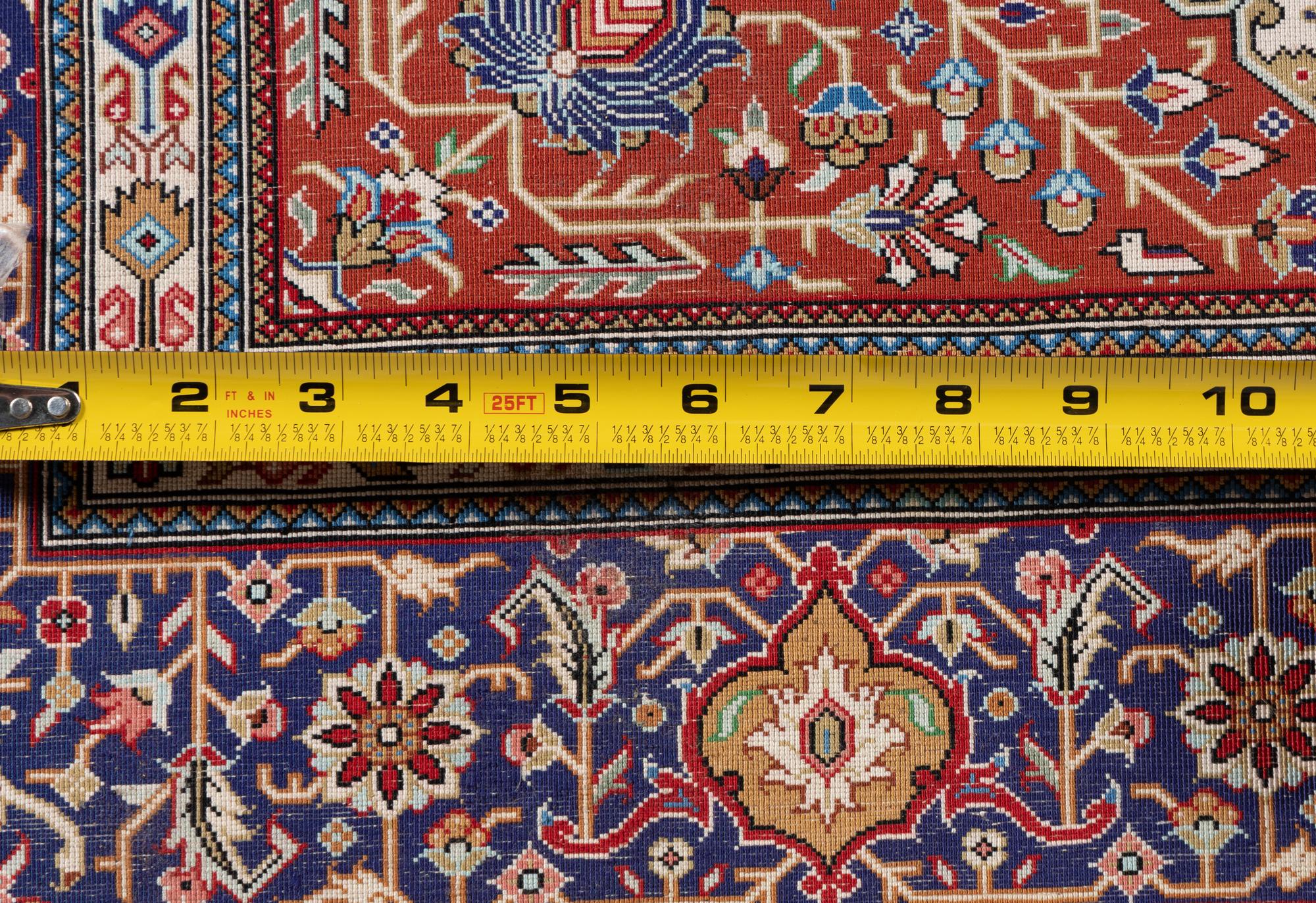 A Signed Silk Rug