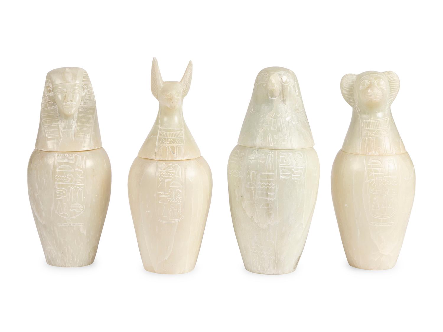 A Set of Four Modern Egyptian Alabaster Canopic Jars
