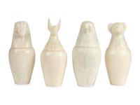 A Set of Four Modern Egyptian Alabaster Canopic Jars