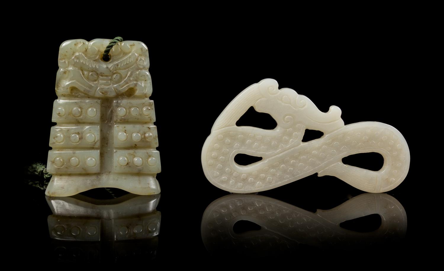 Two Carved Jade Pendants Length of first 2 1/4 inches.
