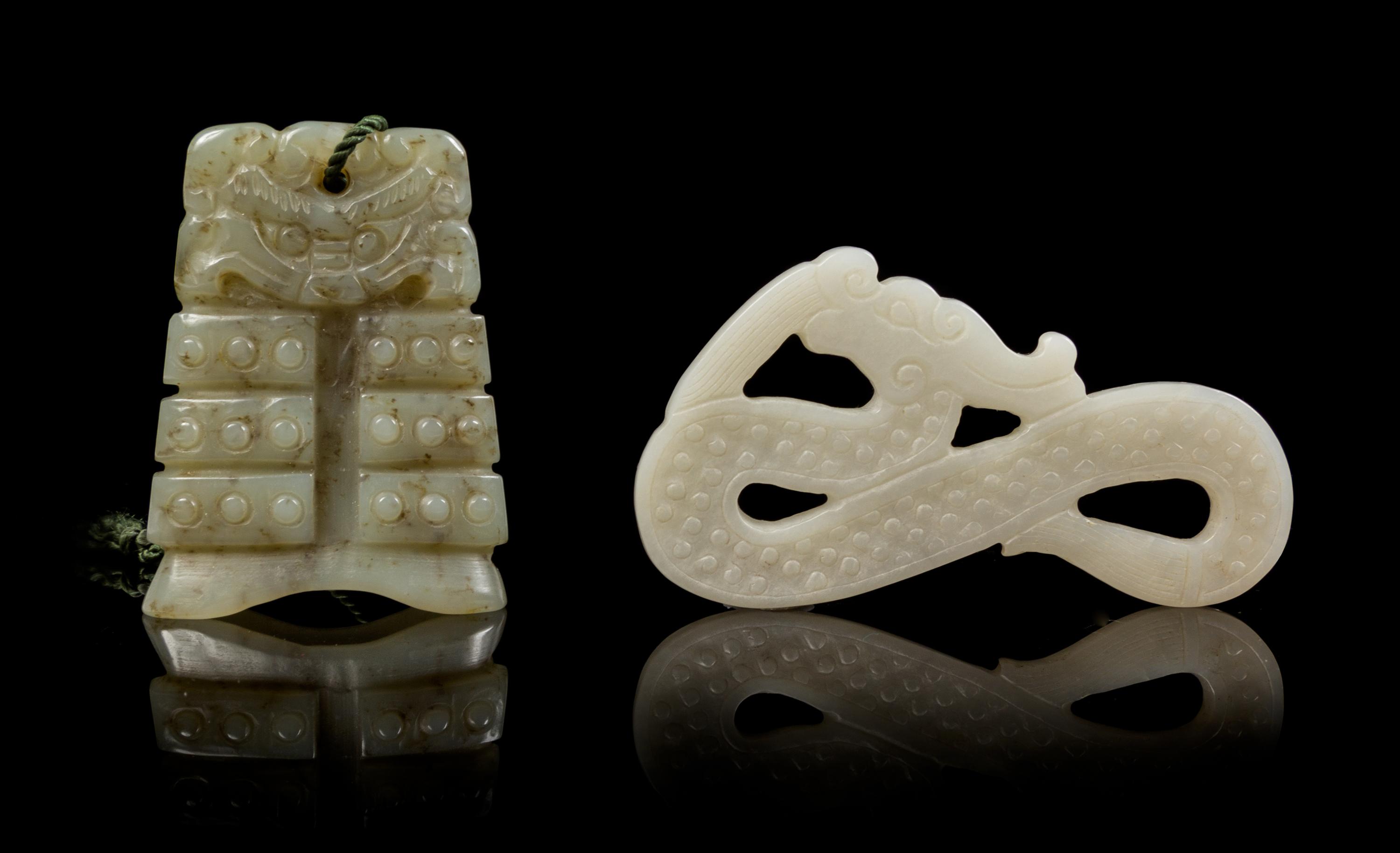 Two Carved Jade Pendants Length of first 2 1/4 inches.