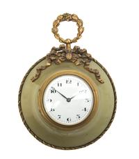 A French Gilt Metal Mounted Onyx Pendant Clock, Selsi, Diameter 4 1/2 inches.