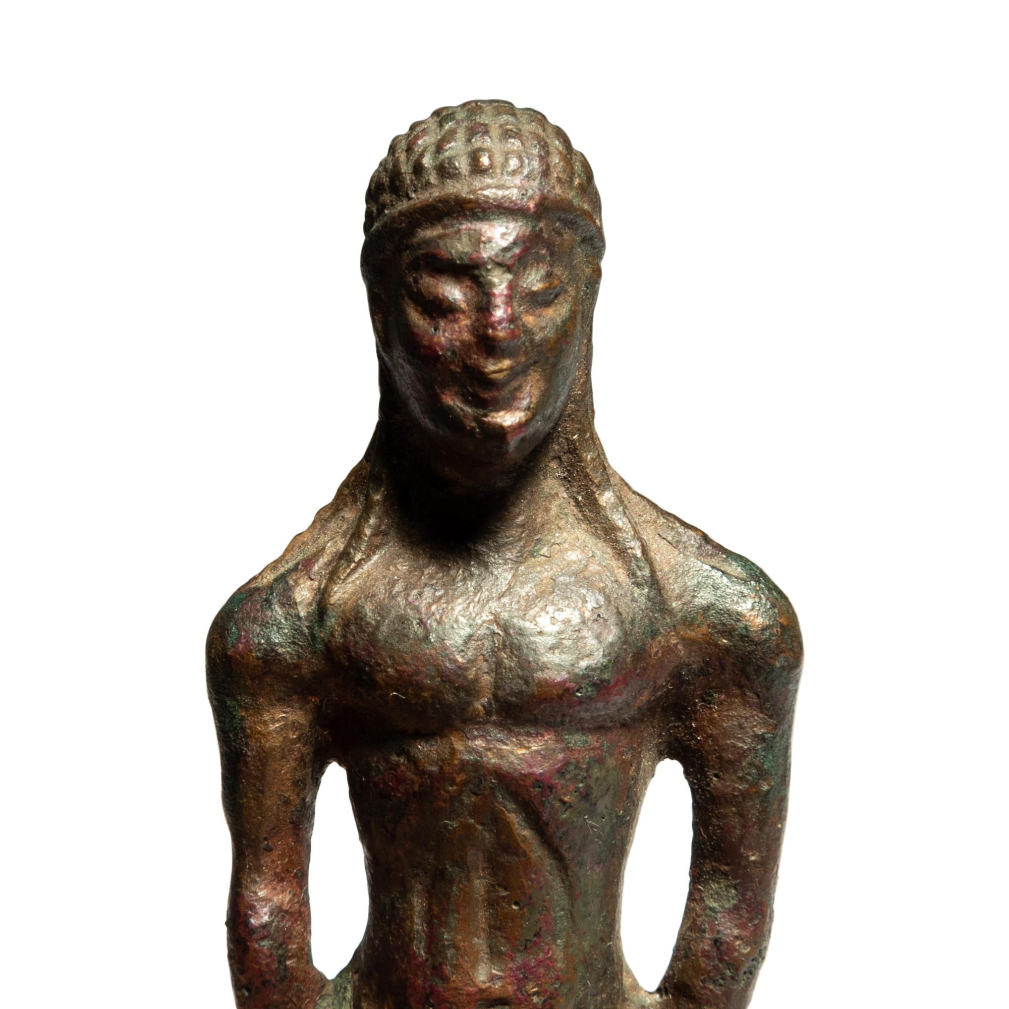 A Greek Bronze Kouros