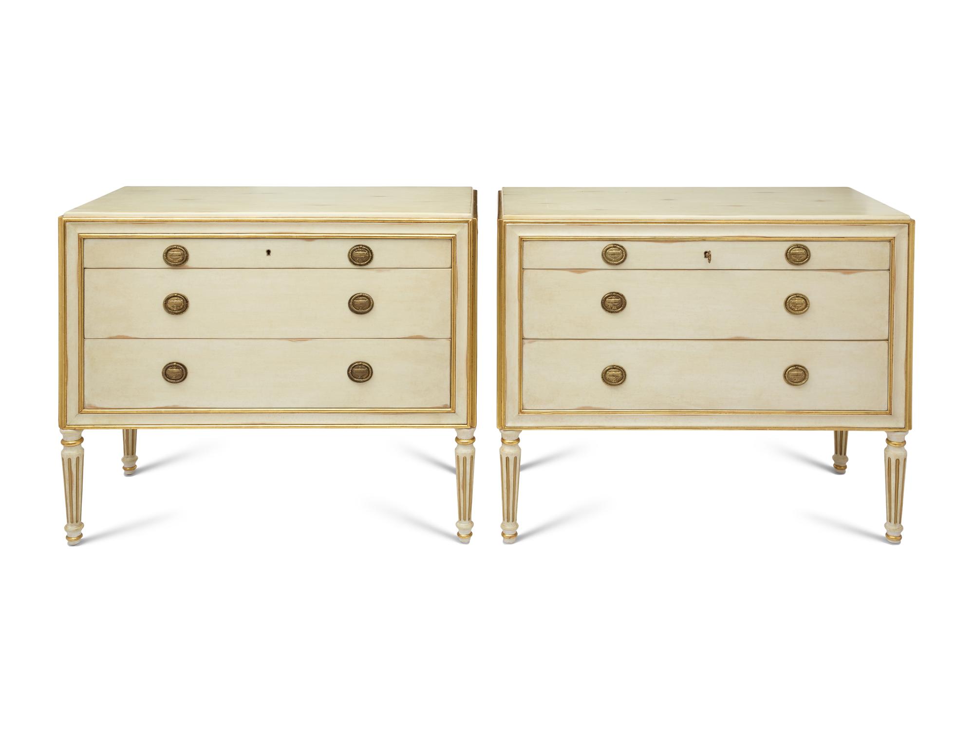 A Pair of Louis XVI Style Painted and Parcel Gilt Commodes