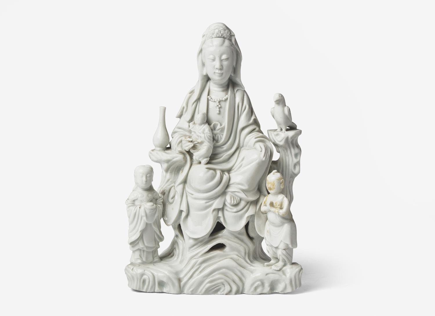 A Chinese Blanc-de-Chine Porcelain Figural Group of Guanyin and Attendants