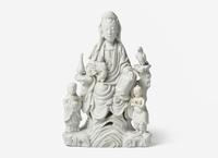 A Chinese Blanc-de-Chine Porcelain Figural Group of Guanyin and Attendants