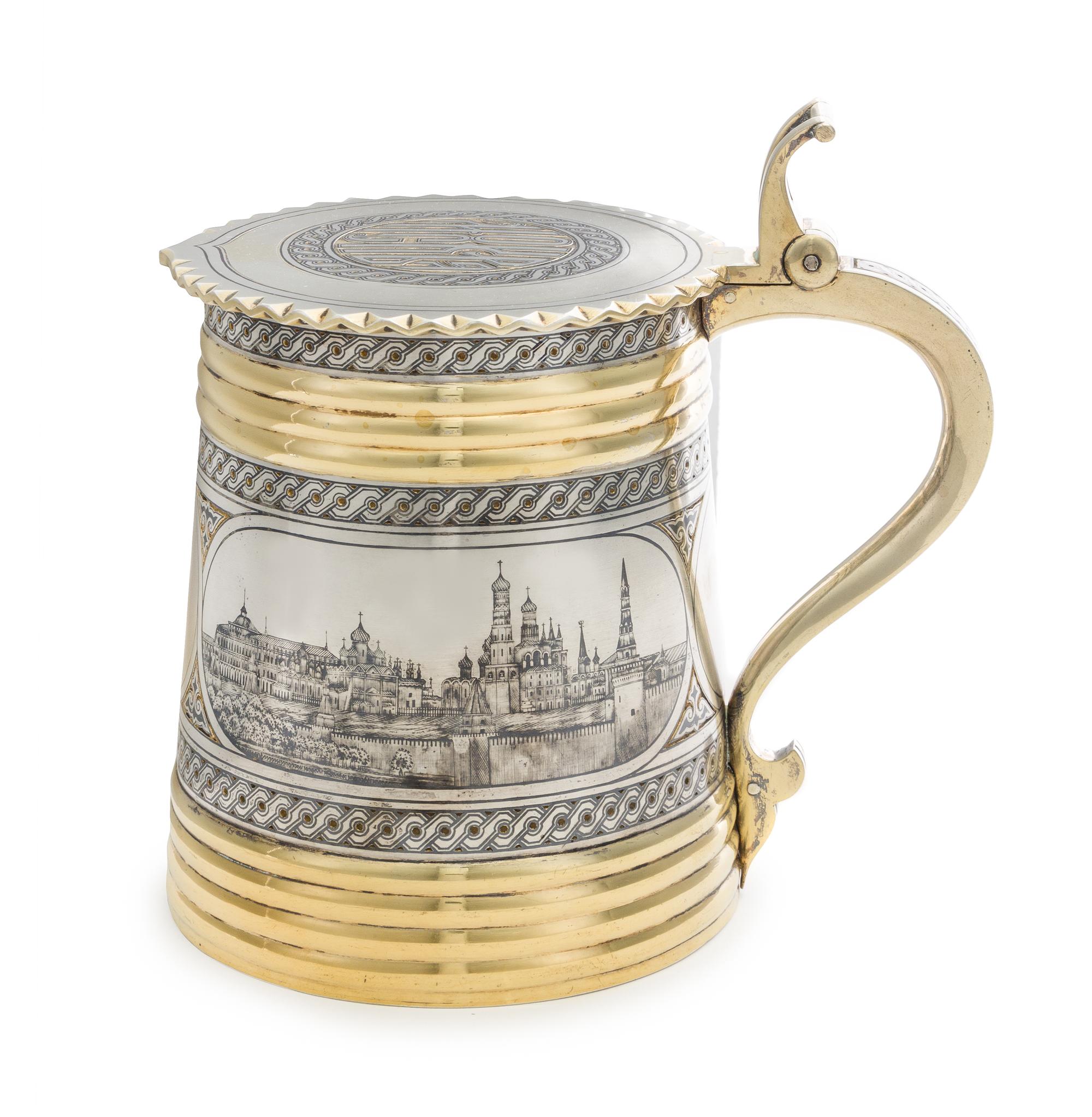 A Large Russian Silver-Gilt and Niello Decorated Tankard, Mark of Sazikov with Imperial Warrant, Assay of Viktor Savinsky, Moscow, 1874