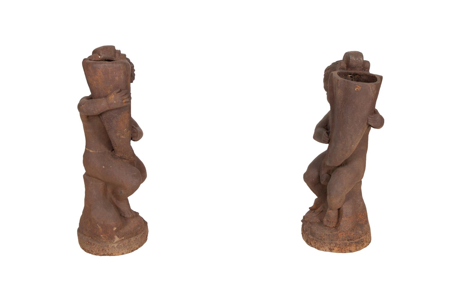 A Pair of Cast Iron Garden Cherubs