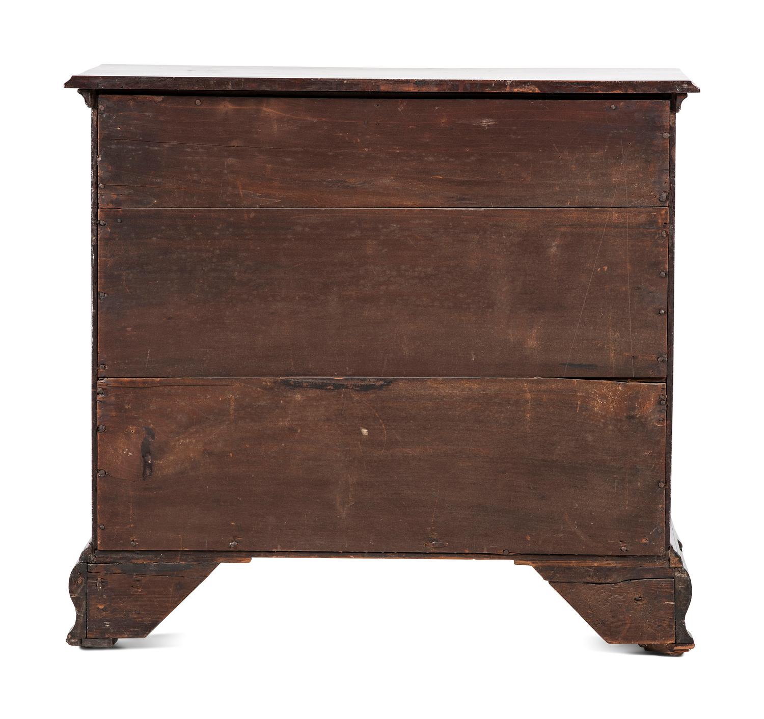 A Chippendale Carved and Figured Mahogany Chest of Drawers
