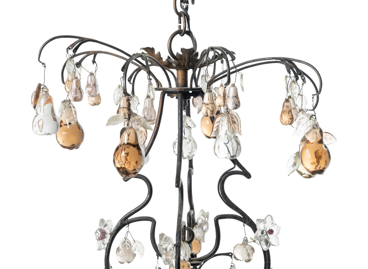 A Louis XV Style Iron and Glass Eight-Light Chandelier