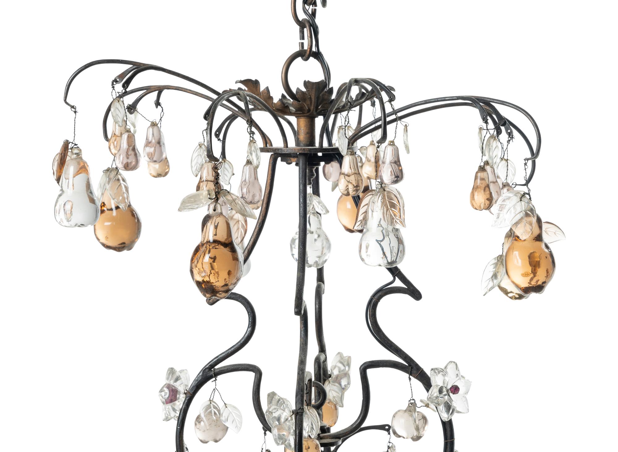 A Louis XV Style Iron and Glass Eight-Light Chandelier