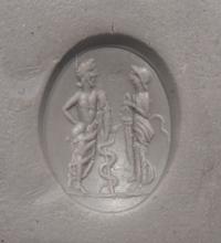 A Roman Carnelian Ring Stone with the God Asclepius and a Satyr