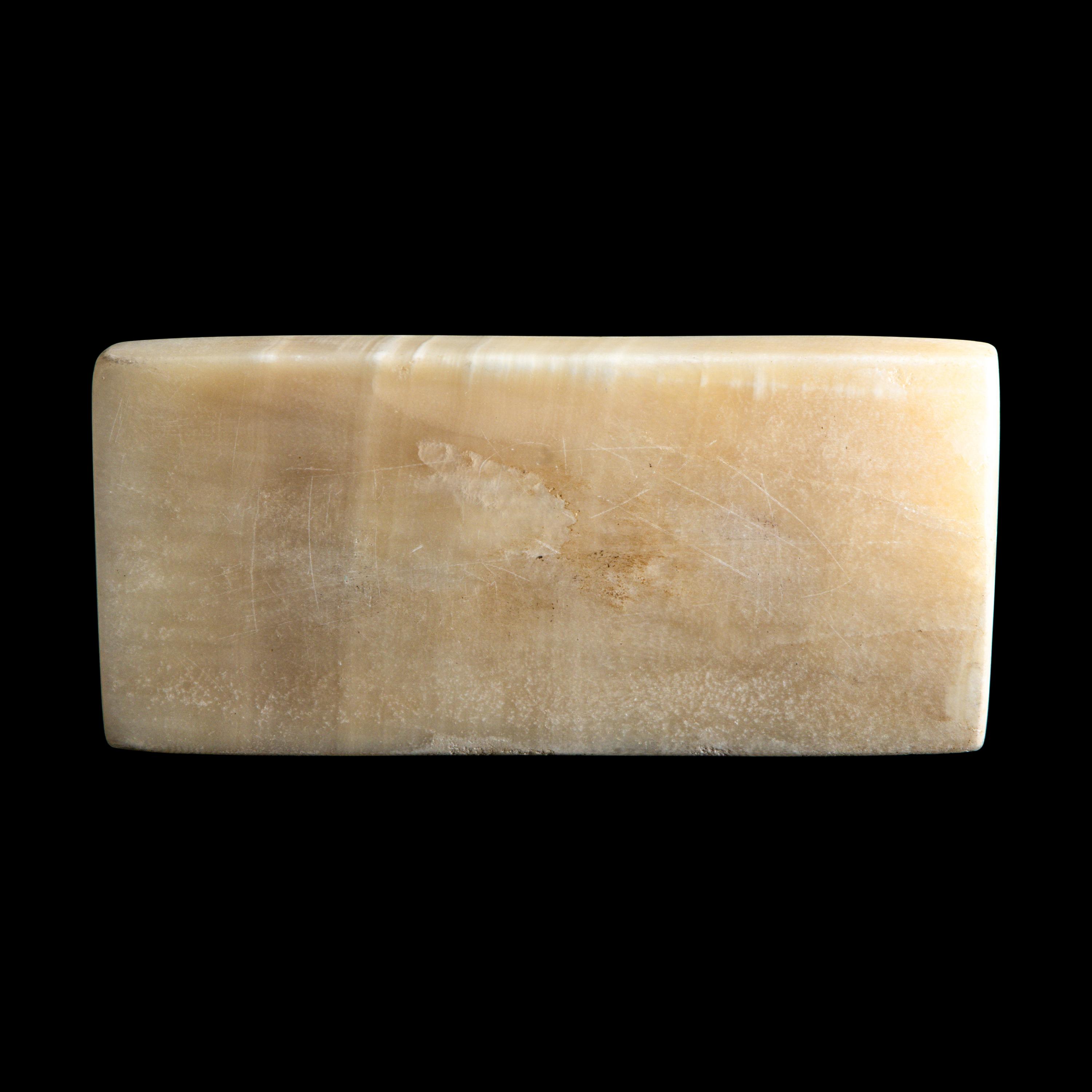 An Egyptian Alabaster Headrest