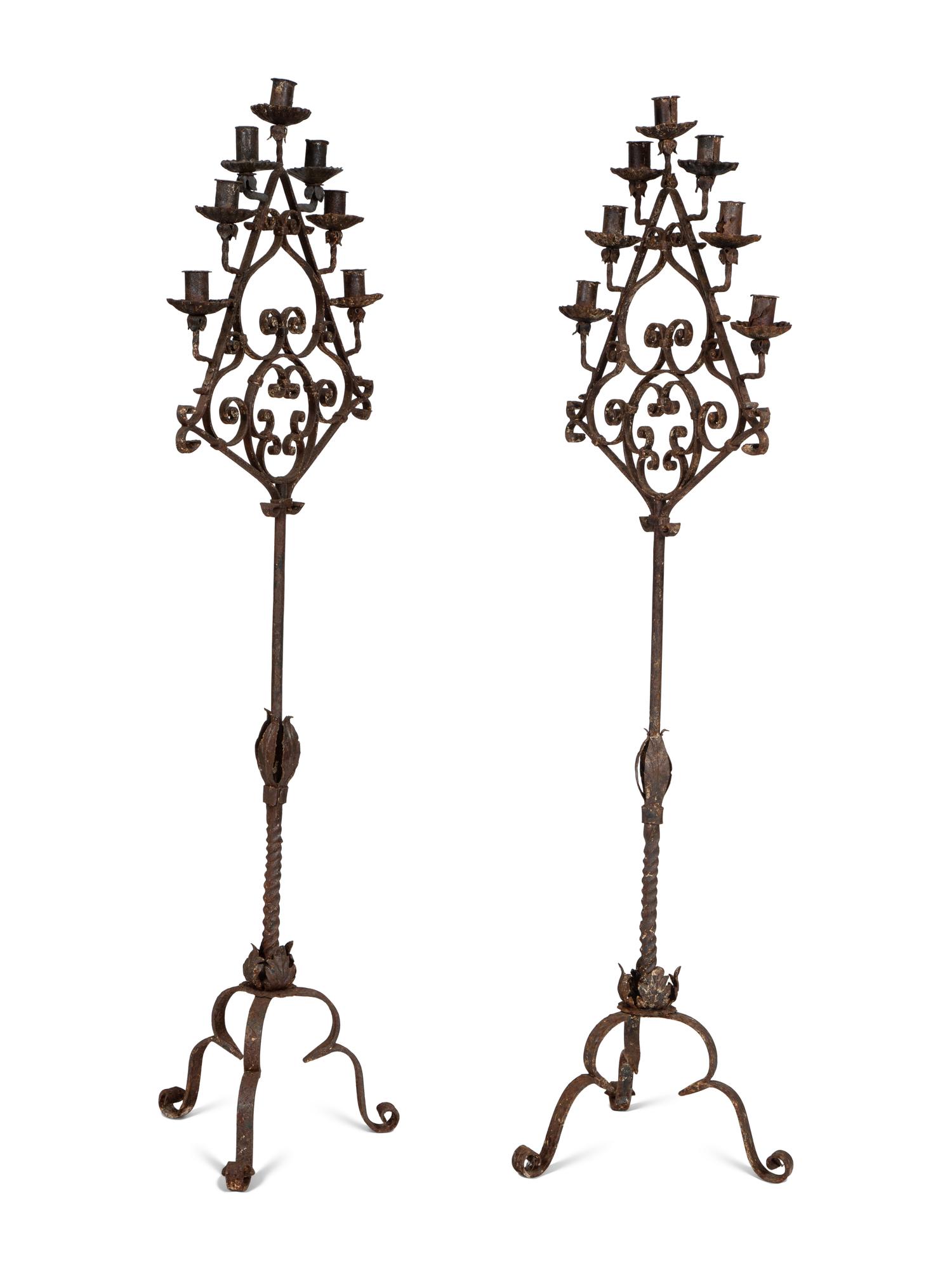 A Pair of Mizner Wrought Iron Seven-Light Floor Candelabra