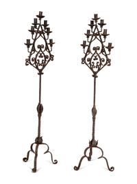 A Pair of Mizner Wrought Iron Seven-Light Floor Candelabra