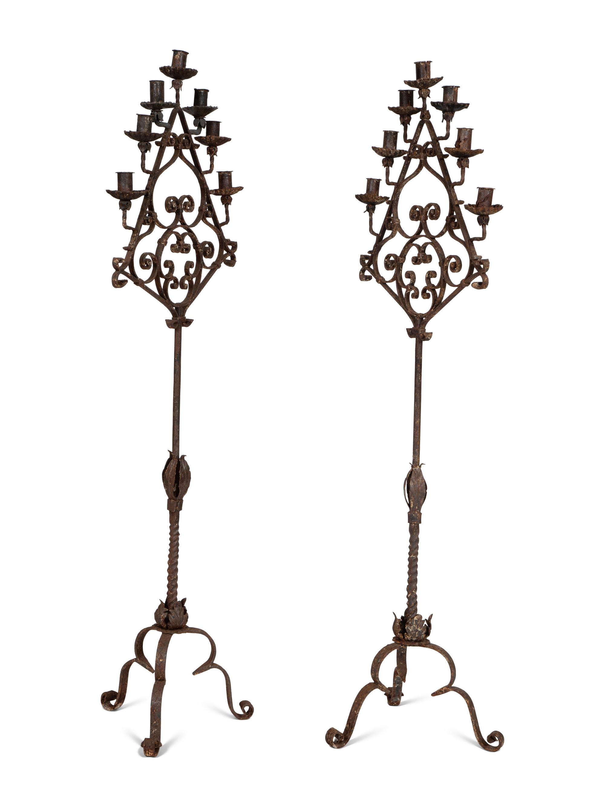 A Pair of Mizner Wrought Iron Seven-Light Floor Candelabra