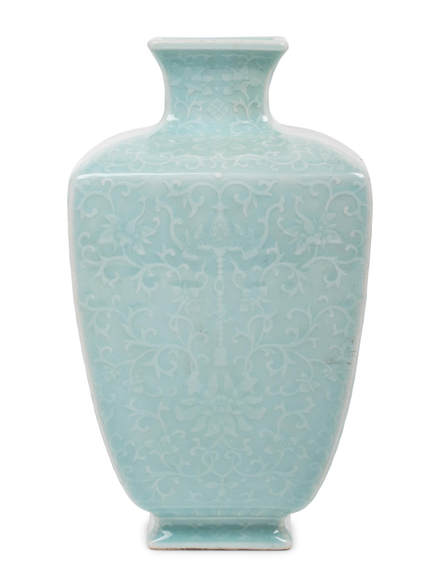 A Chinese Carved Celadon Glazed Porcelain 'Lotus' Vase
