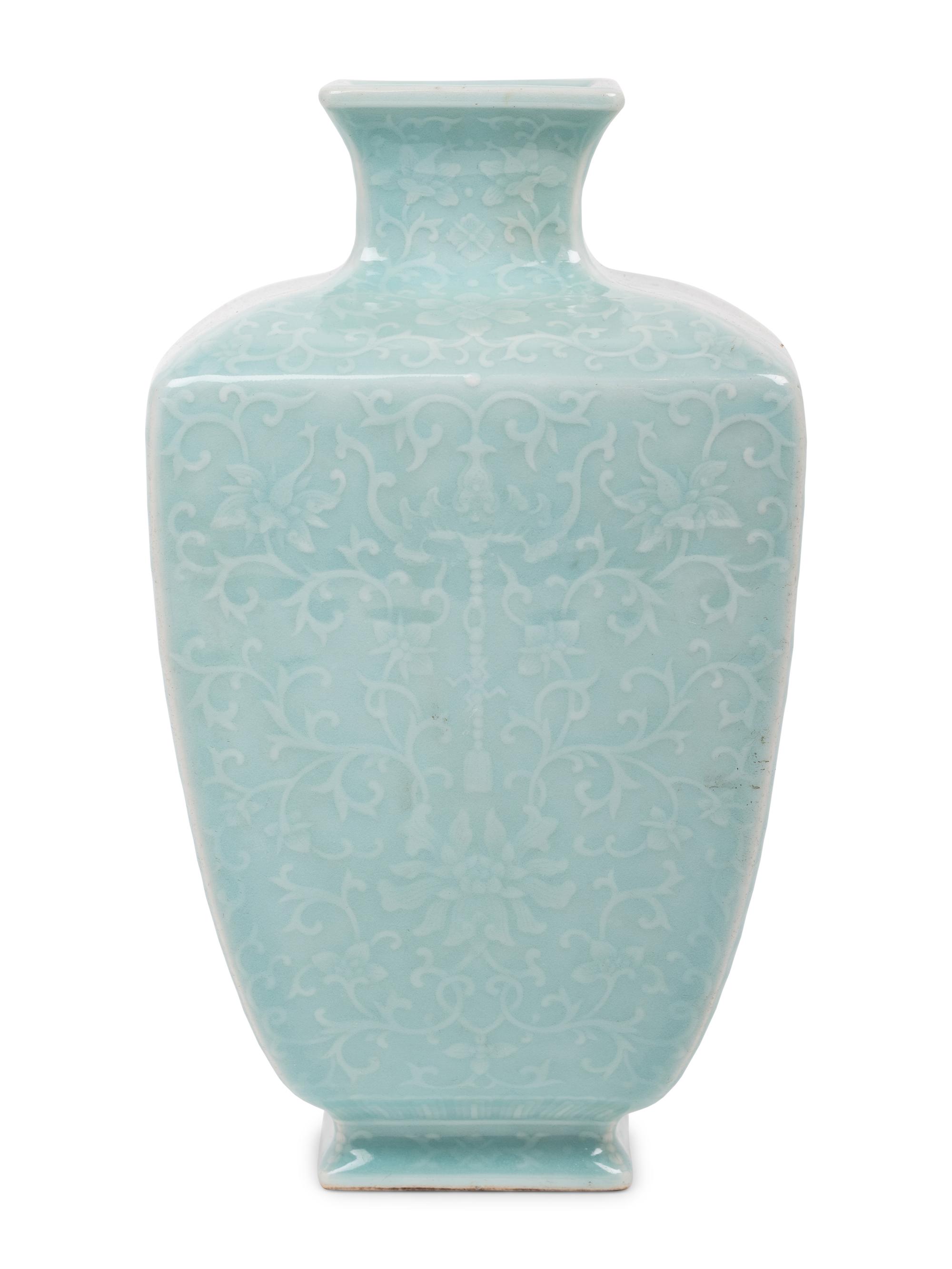 A Chinese Carved Celadon Glazed Porcelain 'Lotus' Vase