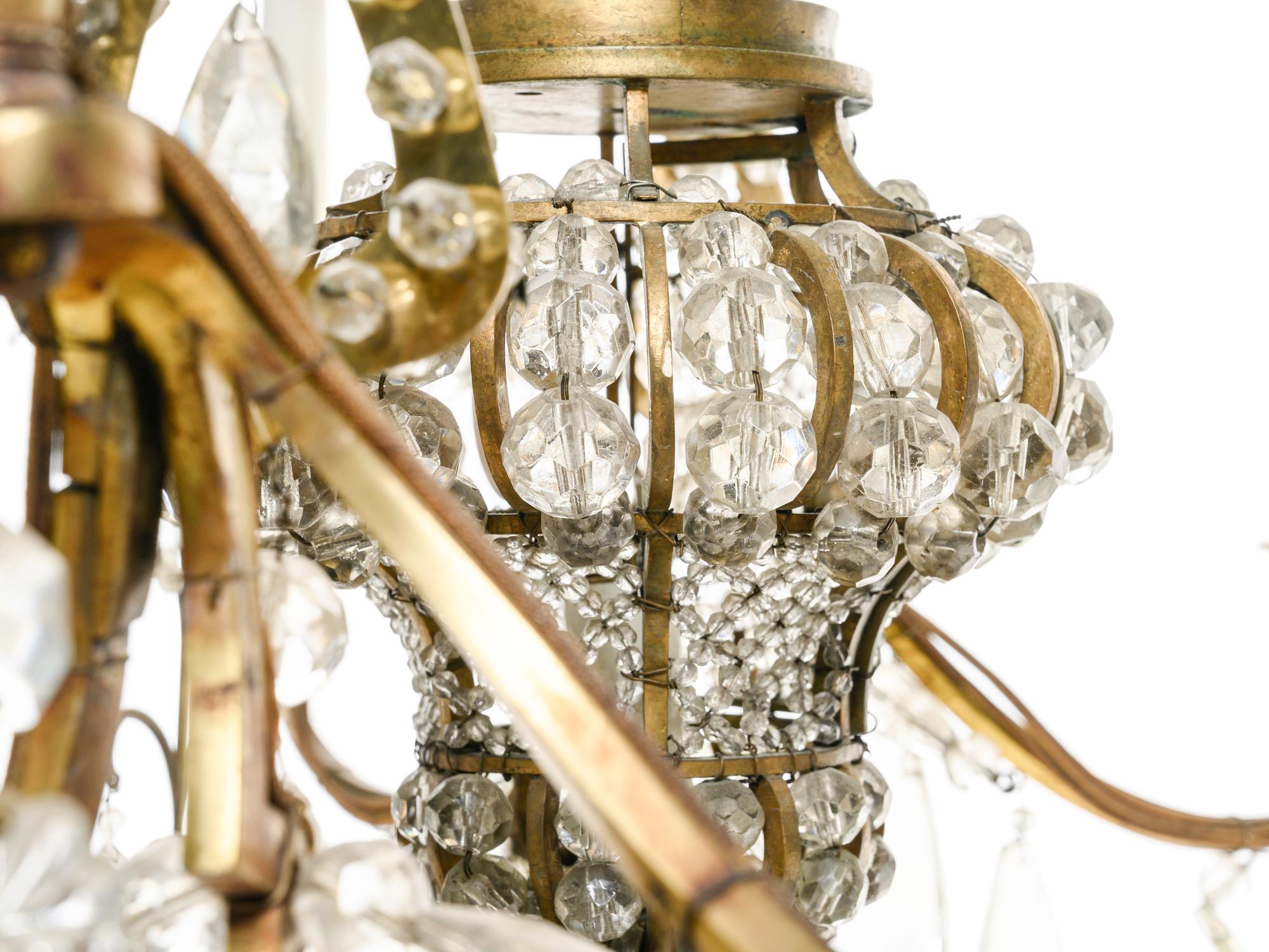 A Pair of French Gilt Bronze and Glass-Beaded Twelve-Light Chandeliers