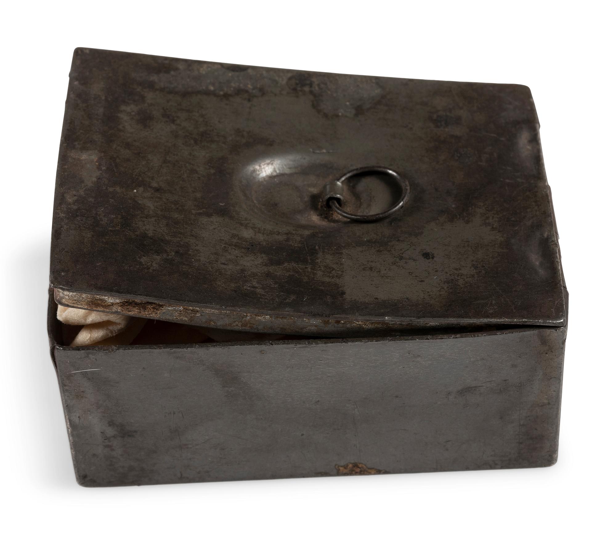 Civil War-period soap container with soap.