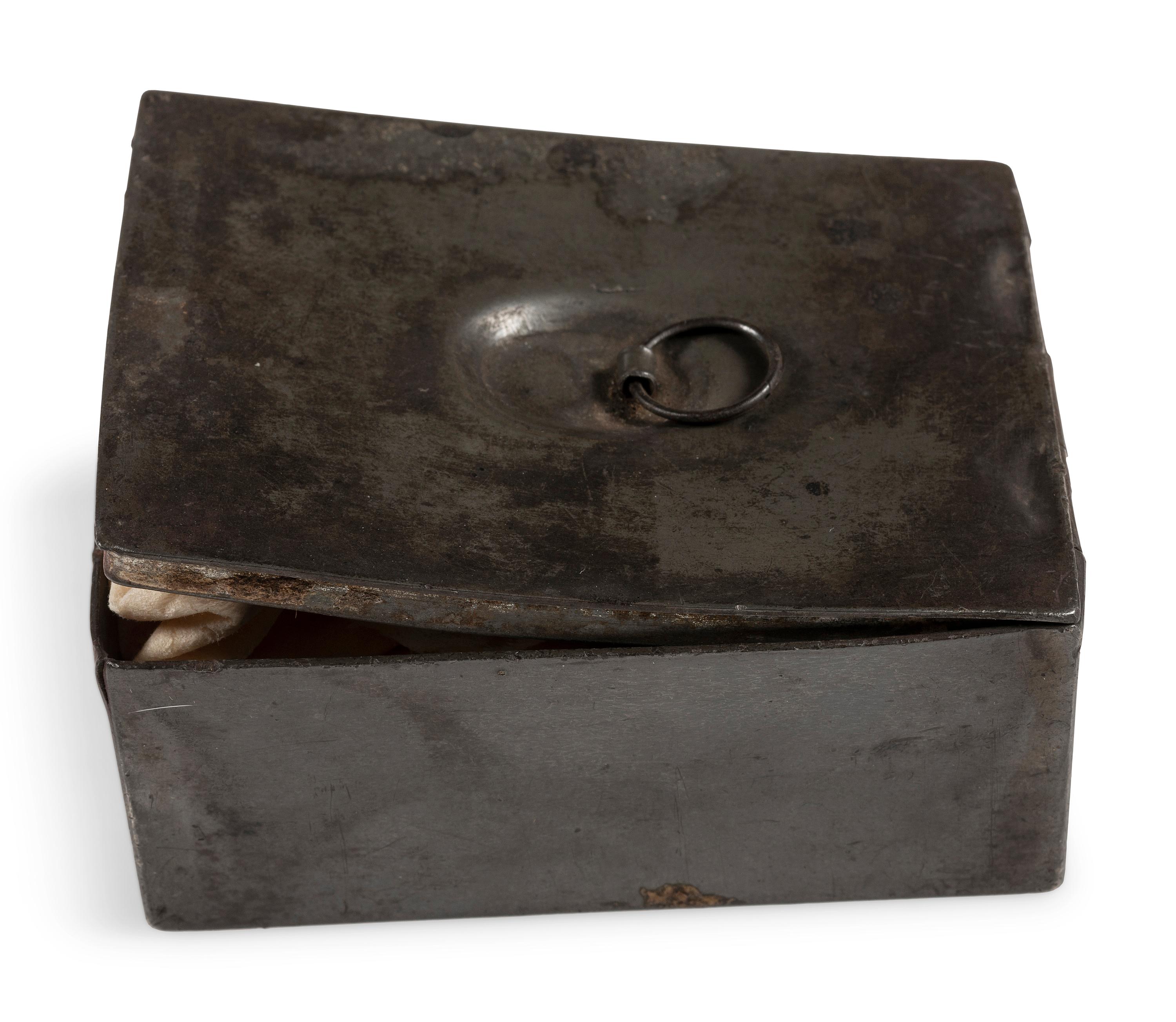 Civil War-period soap container with soap.