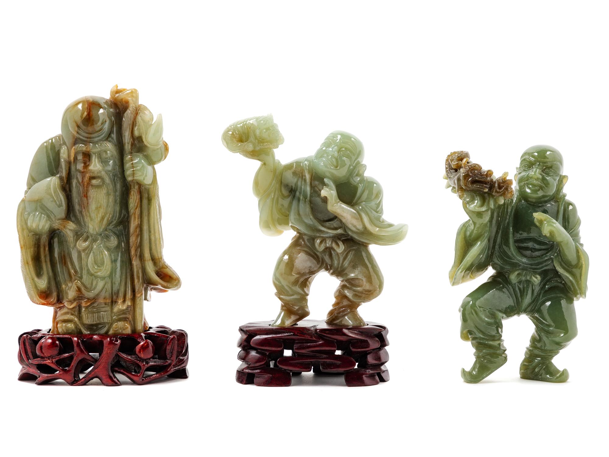 Three Chinese Celadon Jade Figures