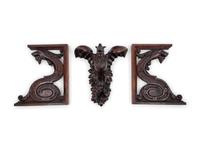 Three Continental Carved Walnut Griffin Form Brackets