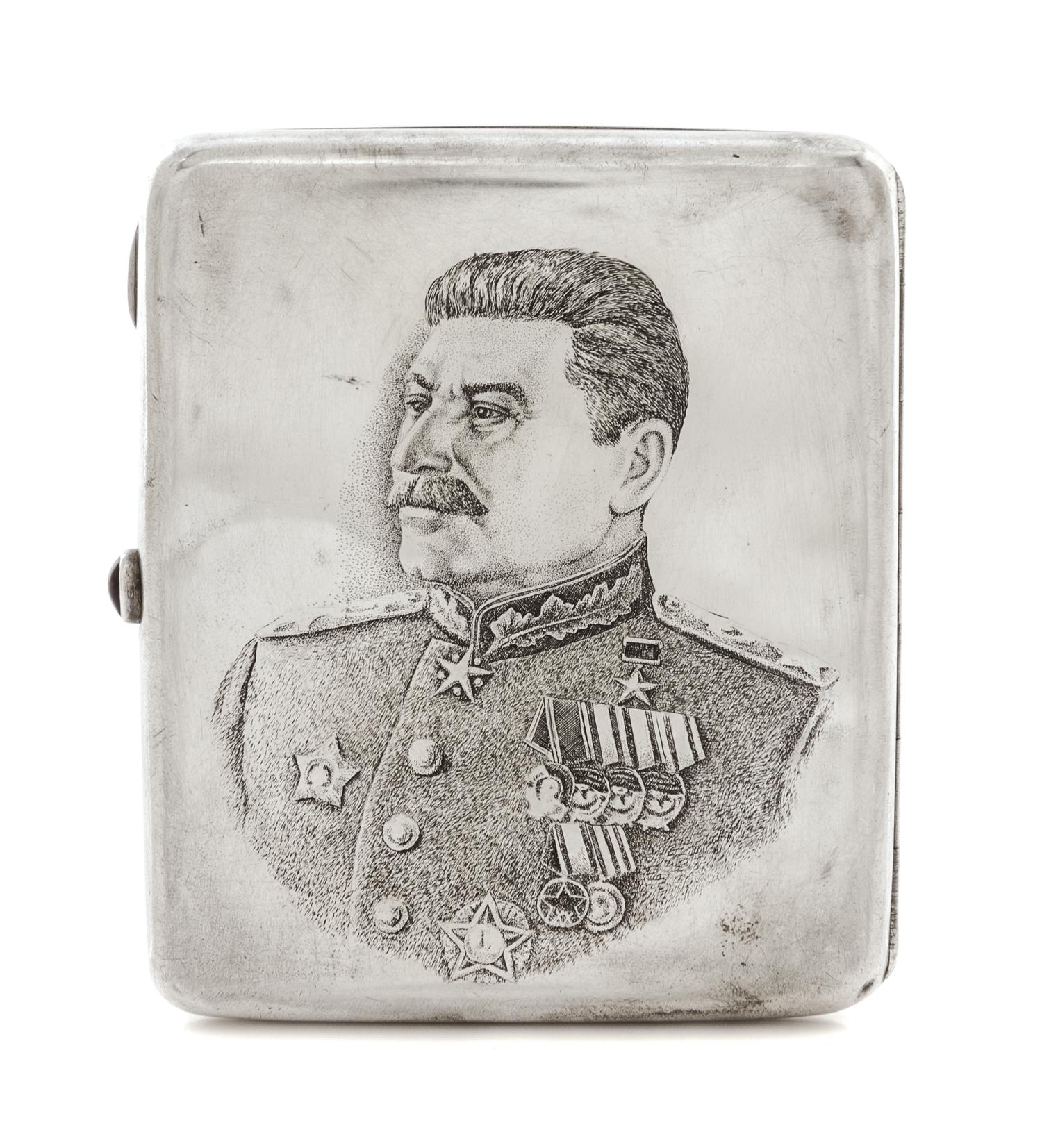 A Russian Niello Silver Cigarette Case, Mark of a Jewelers Artel, Moscow, 20th century, the lid worked to show the Kremlin viewed from