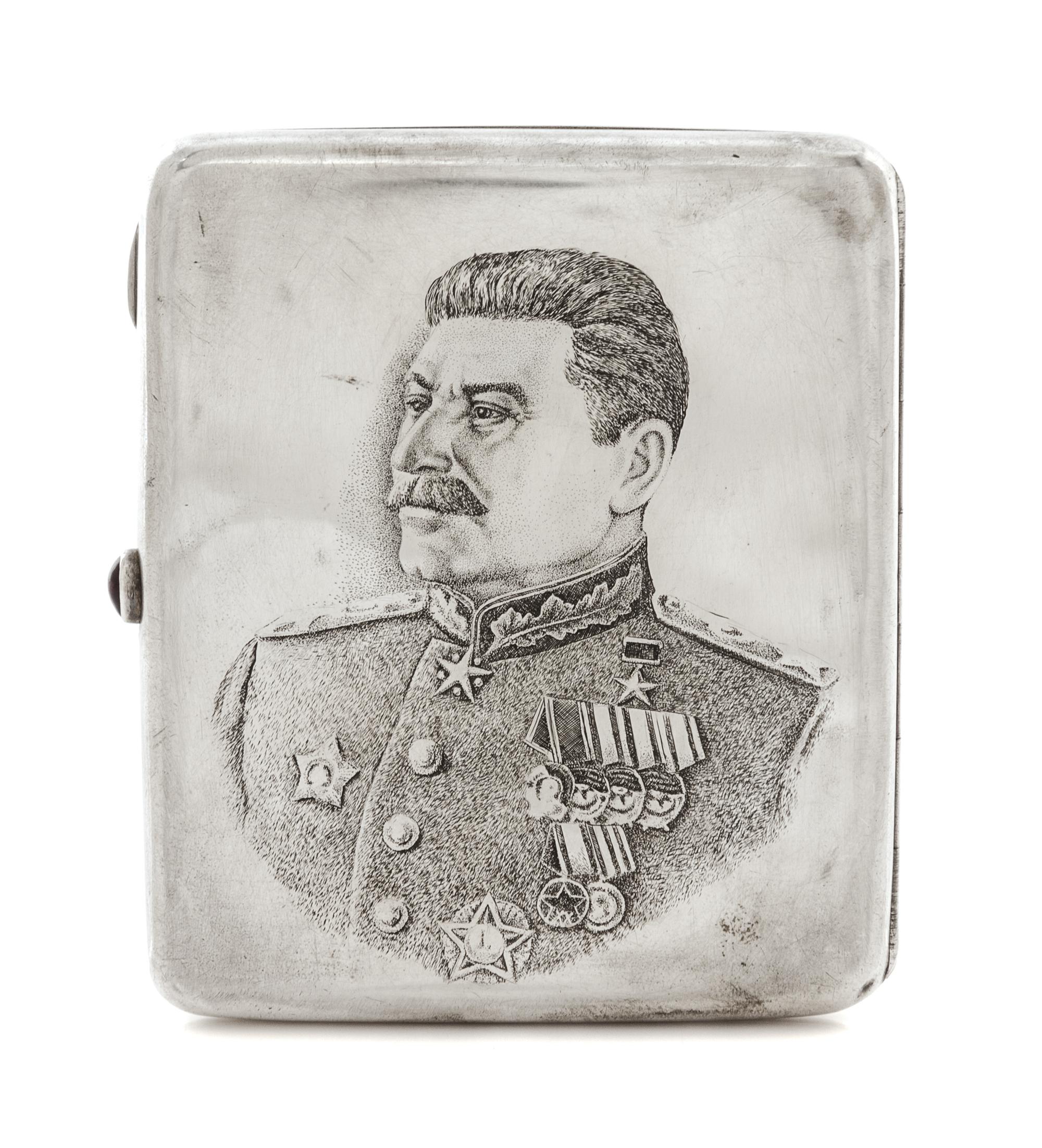A Russian Niello Silver Cigarette Case, Mark of a Jewelers Artel, Moscow, 20th century, the lid worked to show the Kremlin viewed from