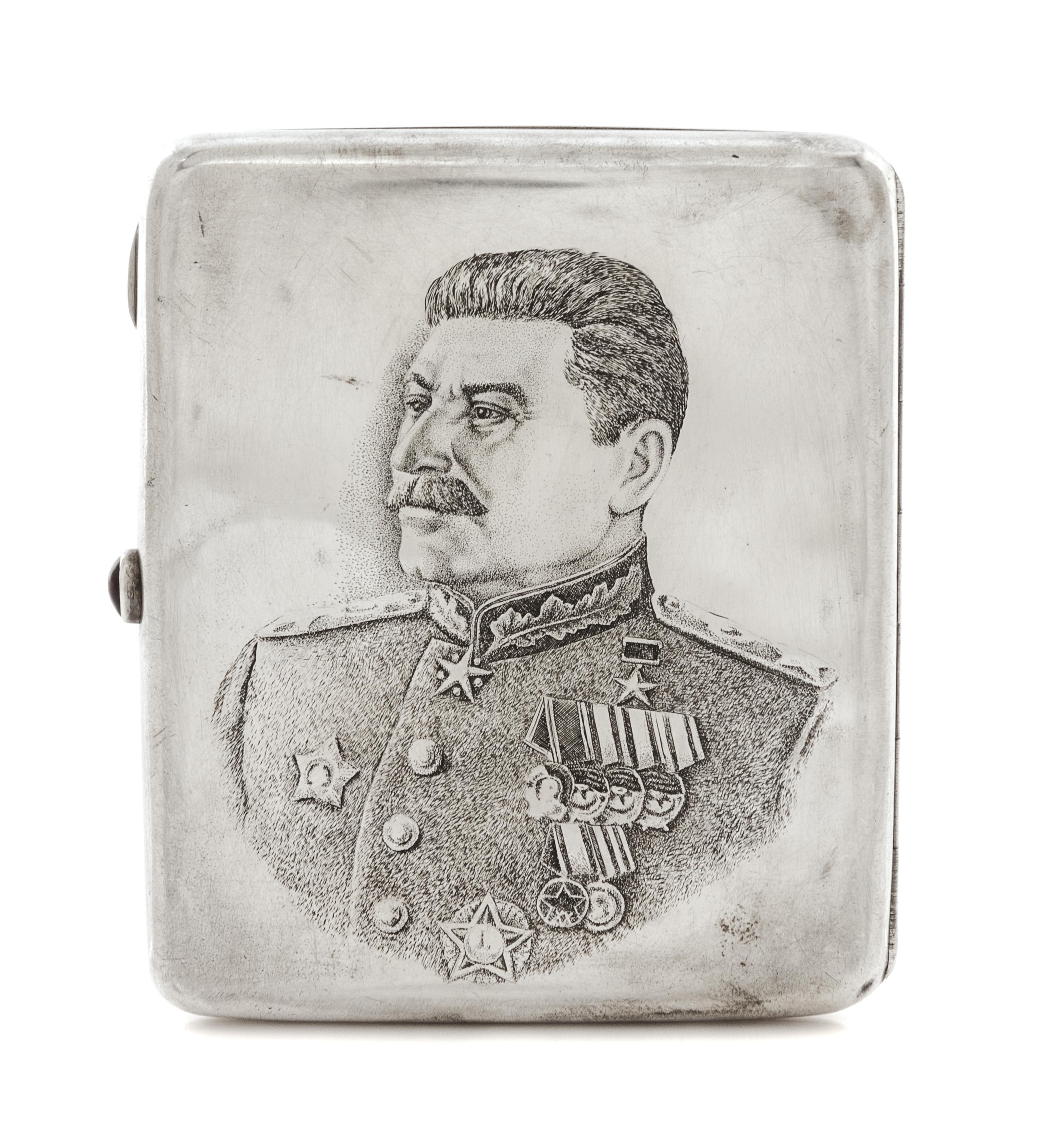 A Russian Niello Silver Cigarette Case, Mark of a Jewelers Artel, Moscow, 20th century, the lid worked to show the Kremlin viewed from