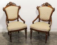 A Pair of Victorian Armchairs Height of each 37 1/4 inches.