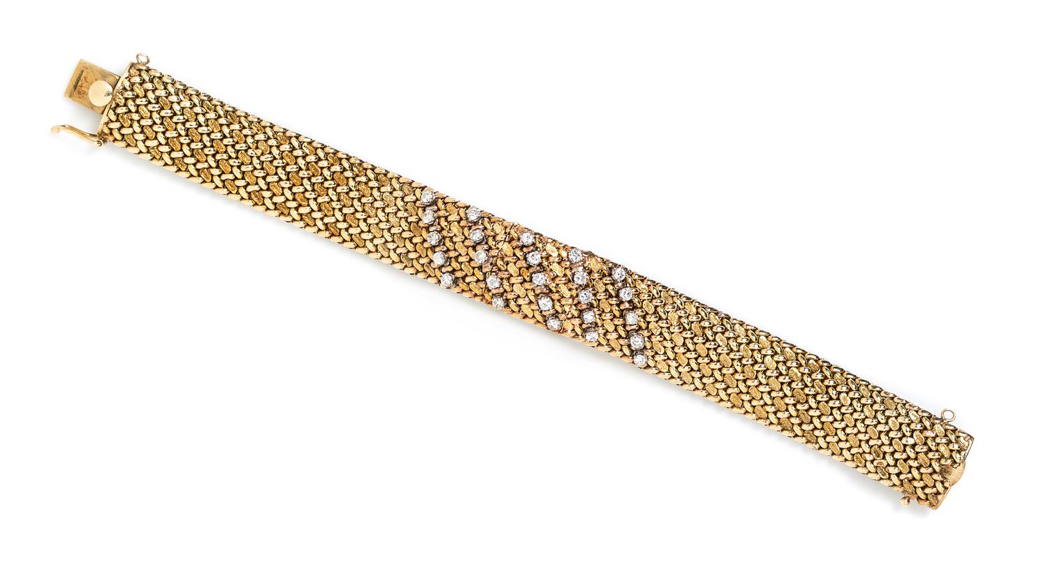 A 14 Karat Yellow Gold and Diamond Bracelet, 31.10 dwts.