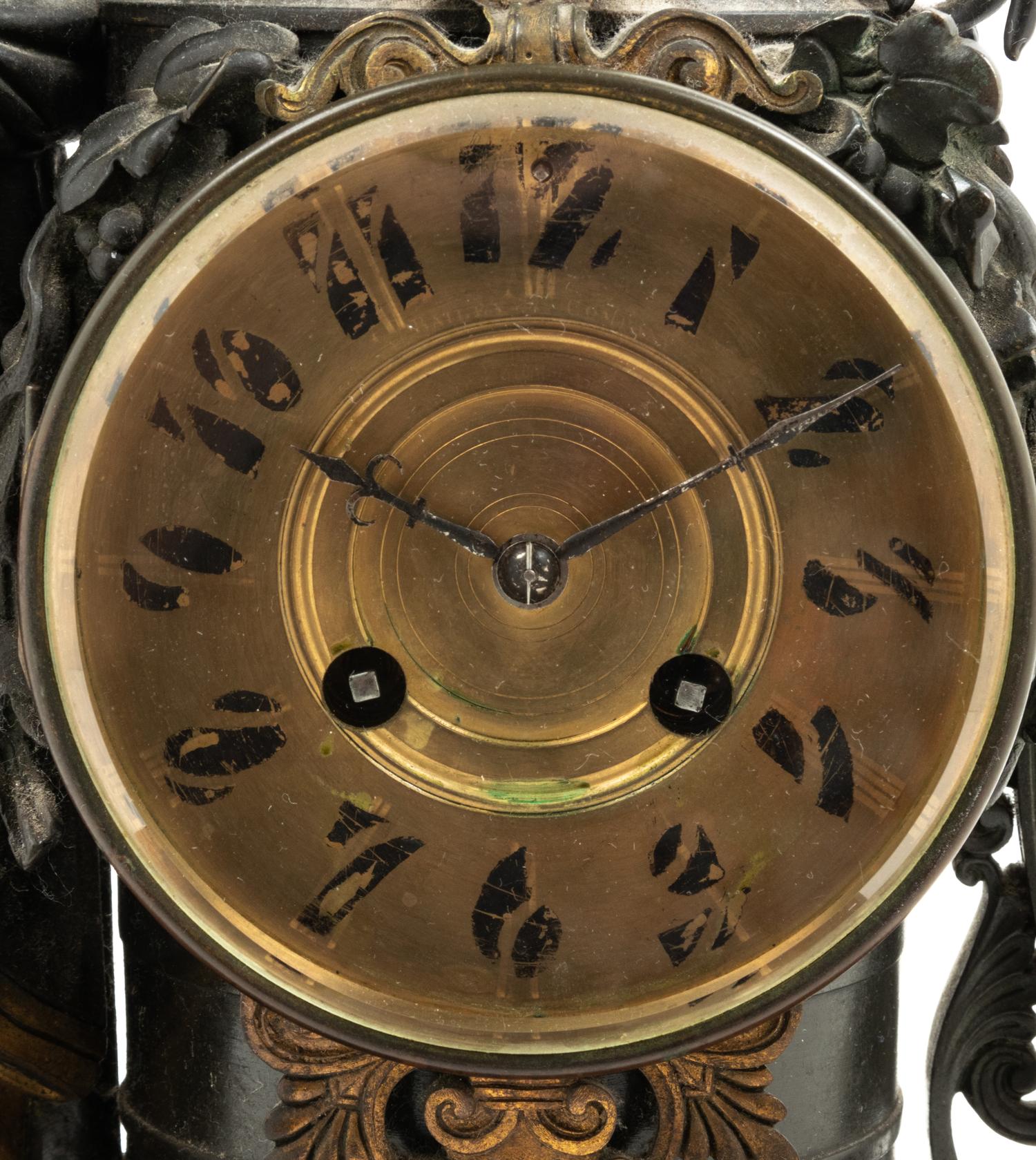 A French Gilt Bronze and Marble Figural Mantel Clock
