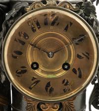 A French Gilt Bronze and Marble Figural Mantel Clock