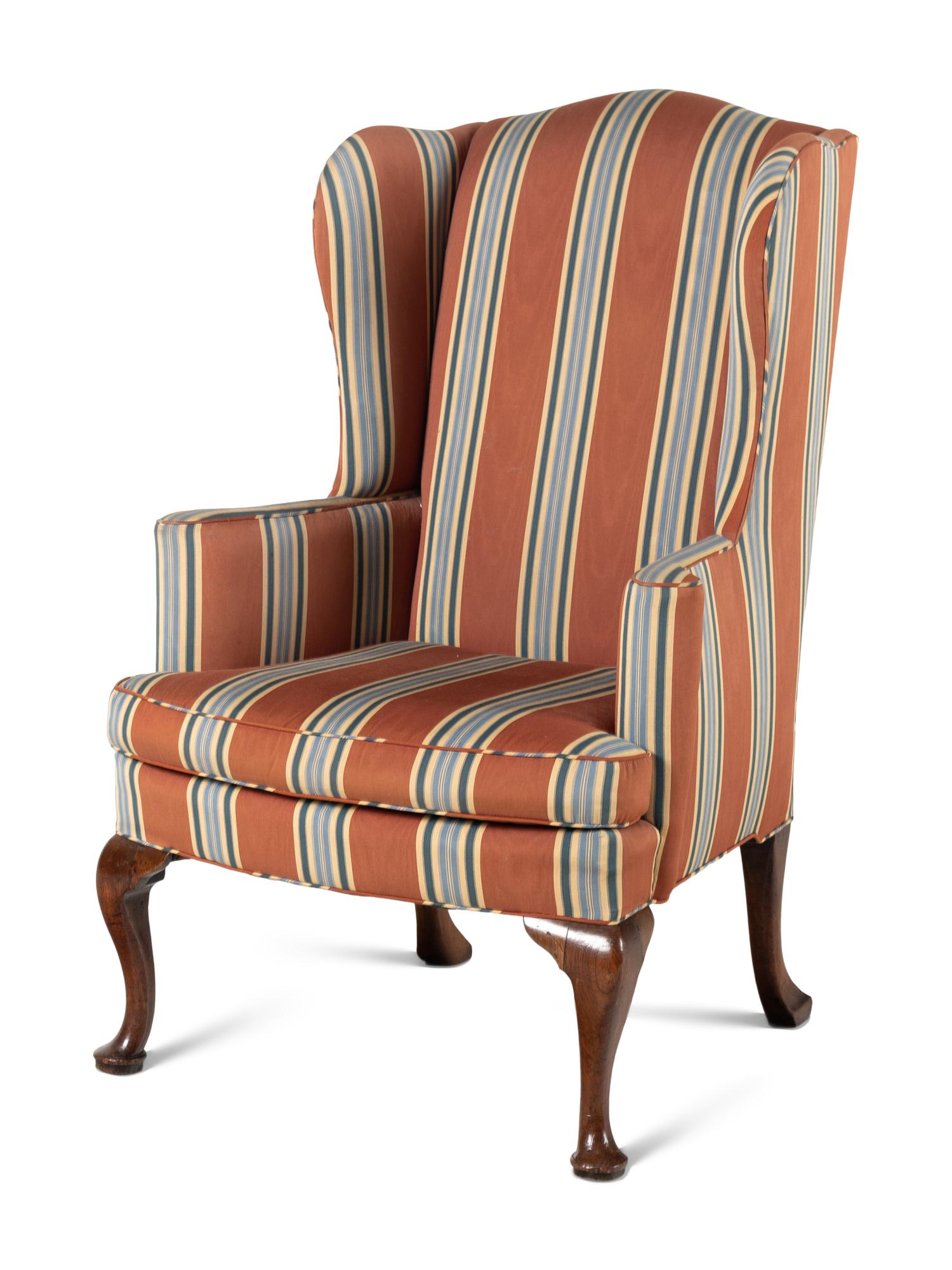 A Queen Anne Walnut Wingback Armchair