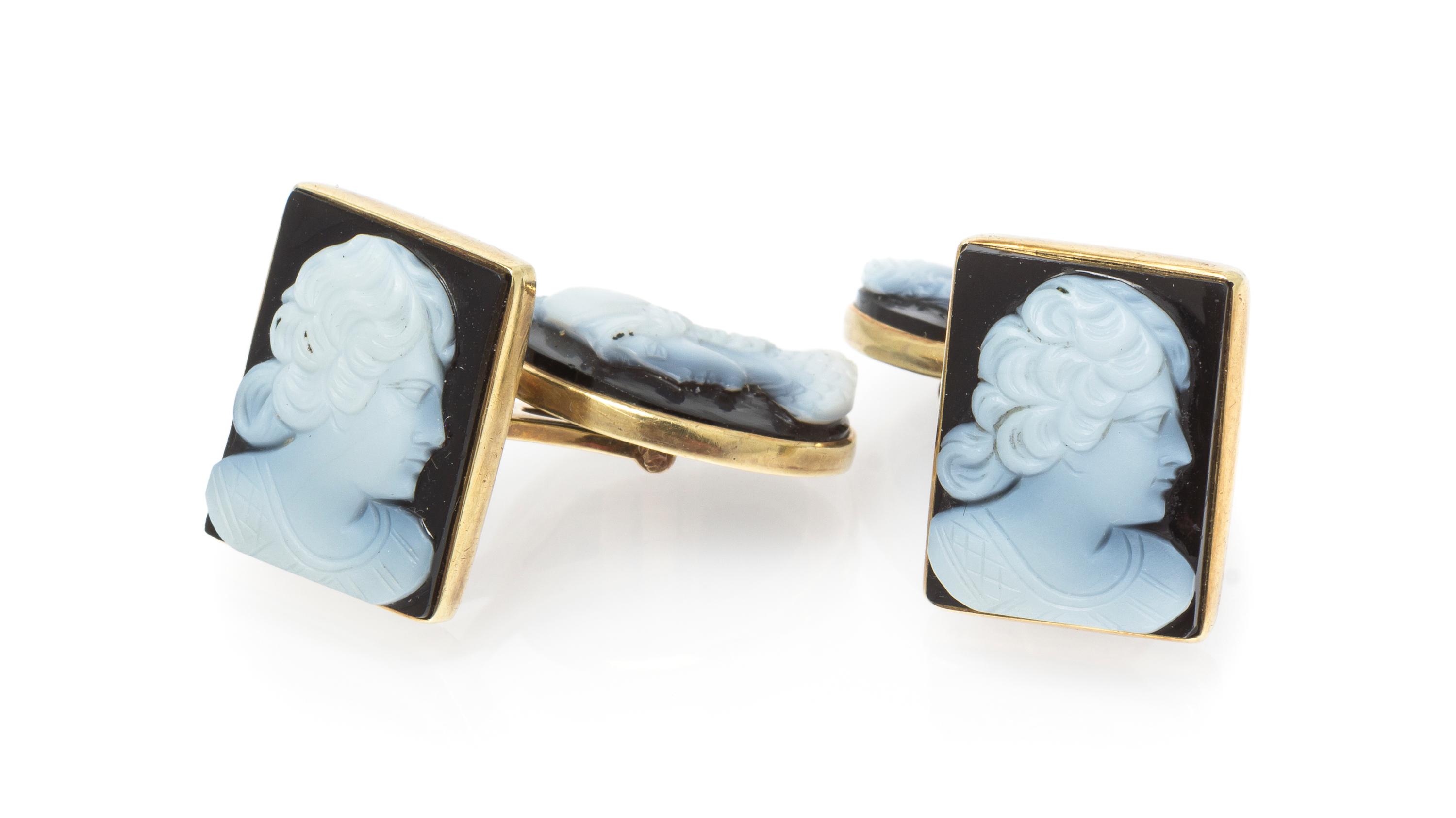 A Pair of Yellow Gold and Onyx Cameo Cufflinks, 6.90 dwts.