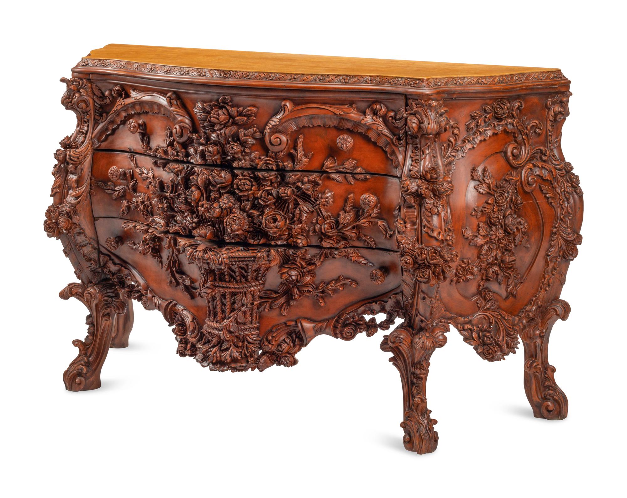 A Continental Floral-Carved and Painted Wood Commode