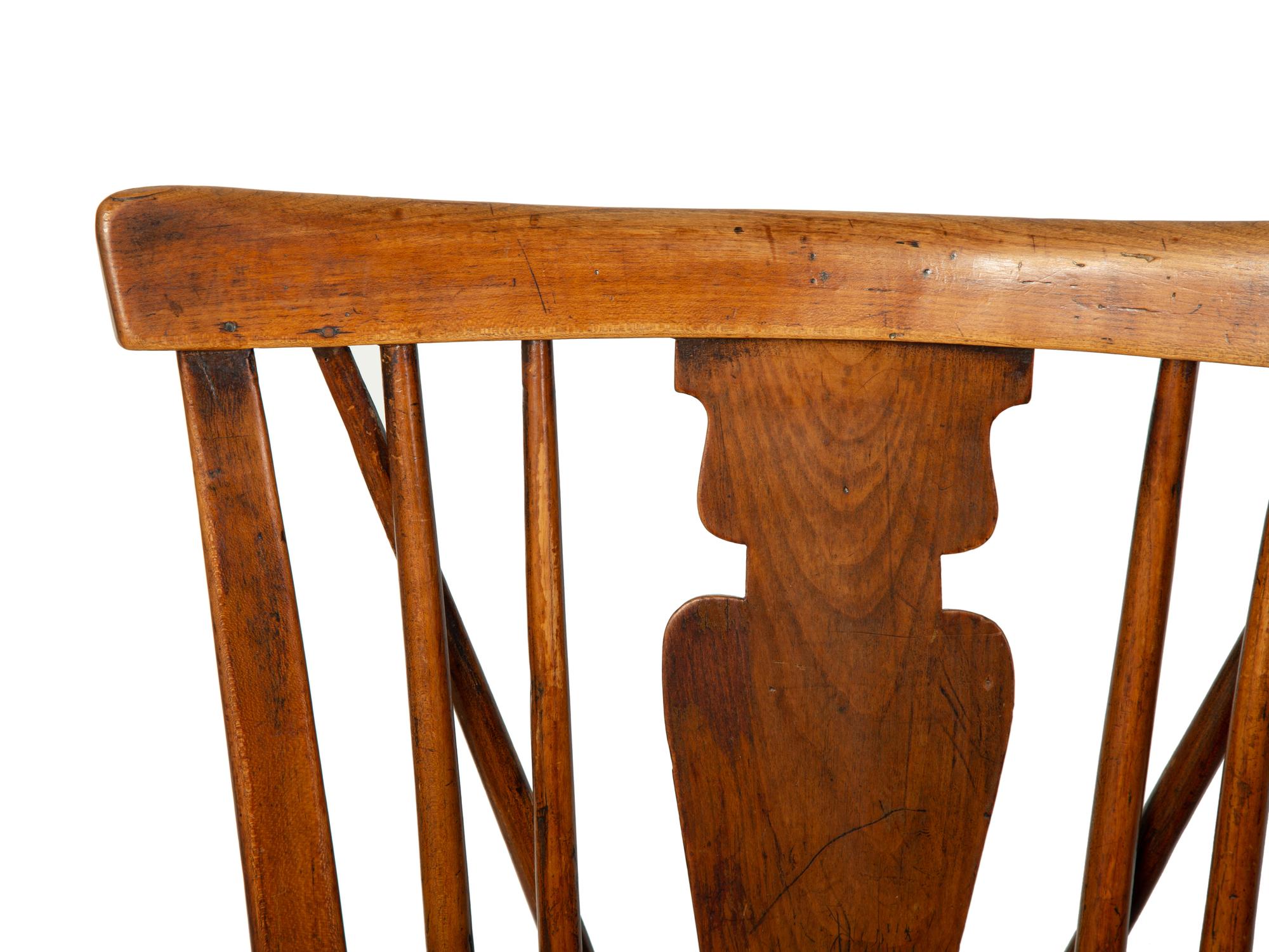 A Set of Eight English Carved Oak Windsor Dining Chairs — 18TH/19TH CENTURY