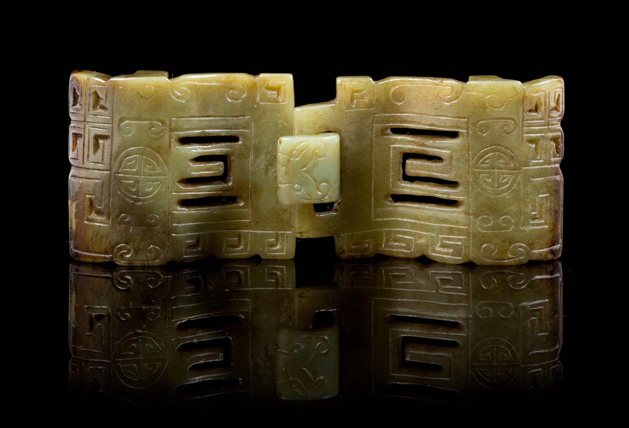 A Carved Jade Belt Buckle Length 4 1/2 inches.