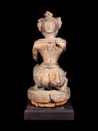 An Indian Carved Wood Figure of a Deity