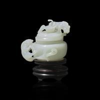 A Small Chinese Carved White Jade ' Qilong' Covered Jar 白玉螭龍蓋罐