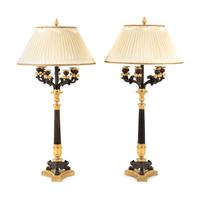 A Pair of Charles X Gilt and Patinated Bronze Seven-Light Candelabra
