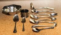 A Collection of Silver and Silver-Plate Flatware Articles, Various Makers, comprising: 1 serving spoon 15 teaspoons 1 sugar tongs 2 sal