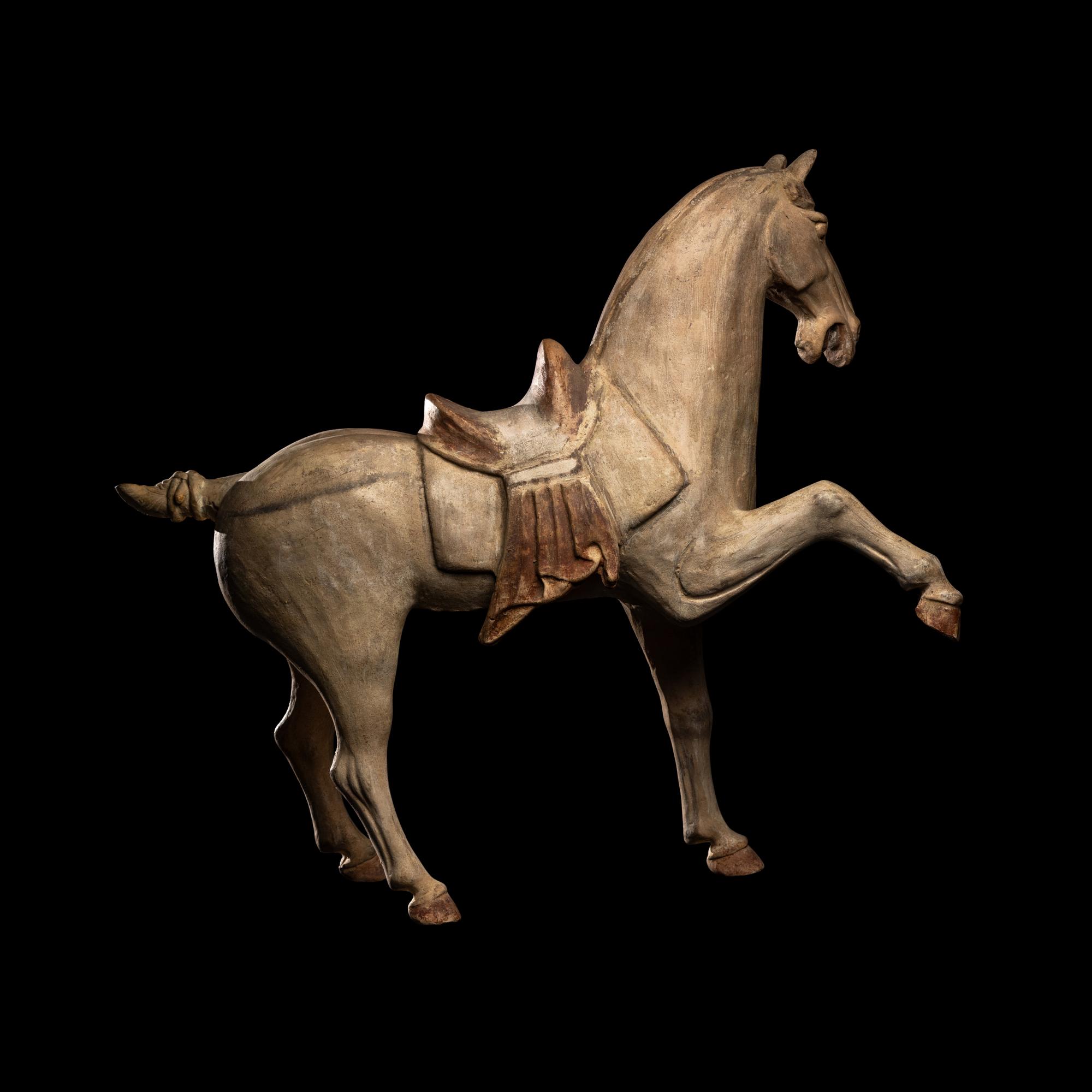 A Chinese Painted Pottery Figure of a Horse