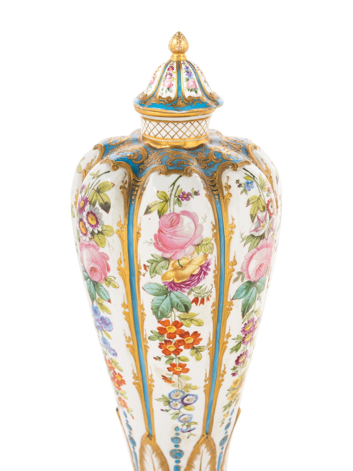 A Pair of Sèvres Style Porcelain Covered Vases