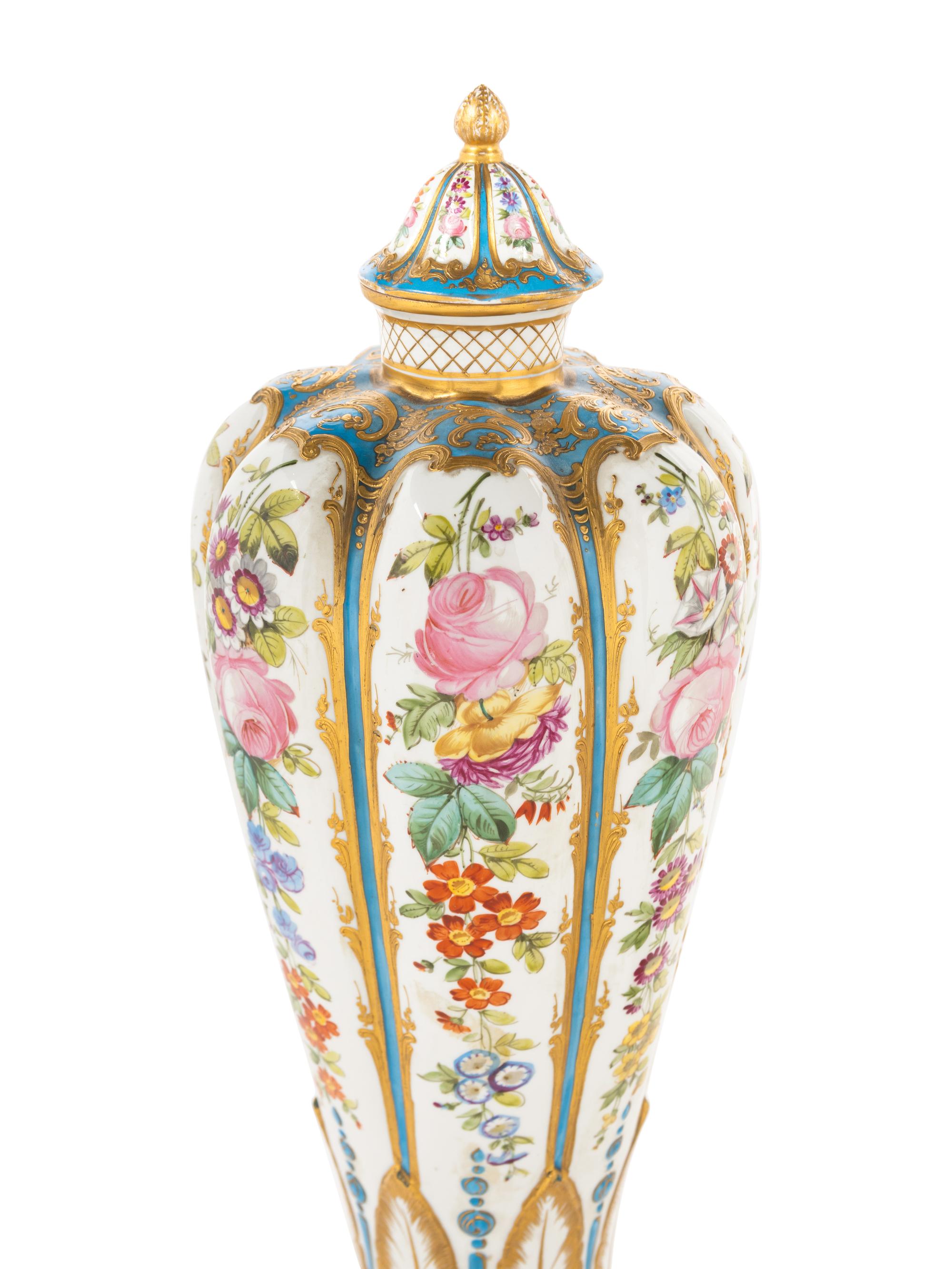 A Pair of Sèvres Style Porcelain Covered Vases