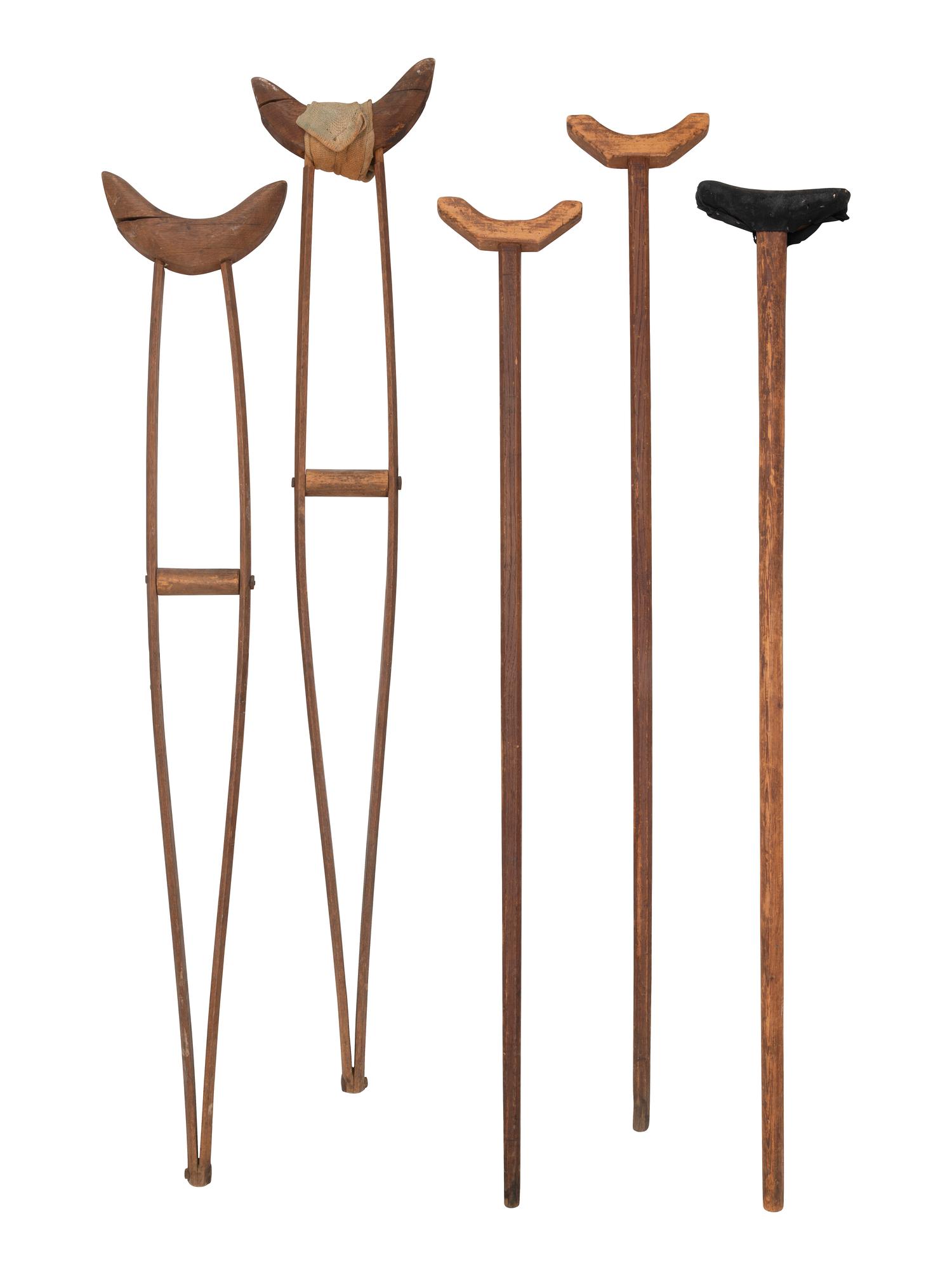 [MILITARIA - MEDICAL]. Medical tools and aids, incl. pair of Civil War-period crutches and brace.